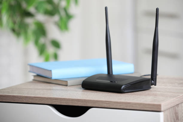 istock Modern Wi-Fi router indoors. Space for text 1318603553