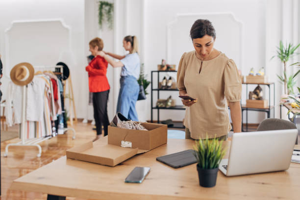 istock Busy day in fashion store 1318604785
