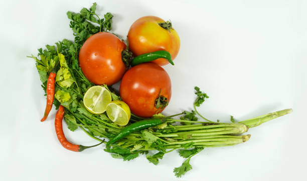 istock a fresh group of vegetables on white background 1318605535
