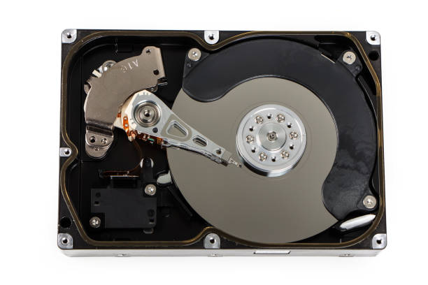 istock Close up inside of computer hard disk drive HDD isolated on white background 1318611645