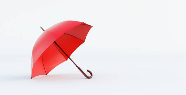 istock classic elegant opened red umbrella isolated on white background. 1318616254