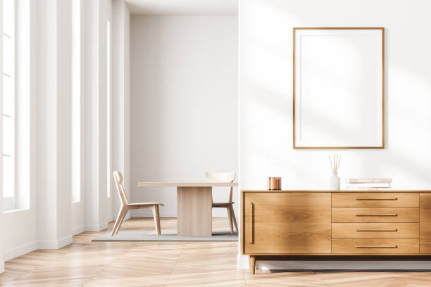 istock Bright living room interior with windows, two chairs and poster 1318618752