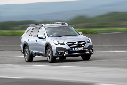 Diedenbergen, Germany - May 12, 2021: Subaru  Outback Legacy fifth generation on a highway nearby Wiesbaden in Germany. The Subaru Outback is an all-wheel-driven station wagon made by the Japanese car manufacturer Subaru