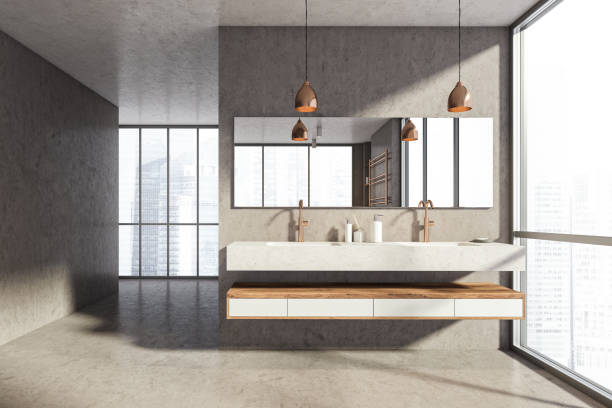istock Bathroom interior with two sinks, panoramic window with city view 1318619895