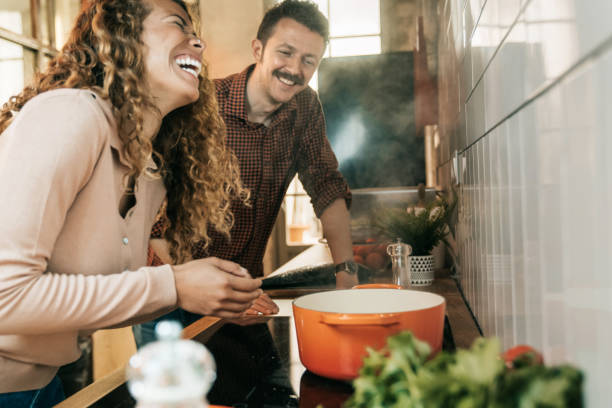 istock Couple cooking in the kitchen 1318620216
