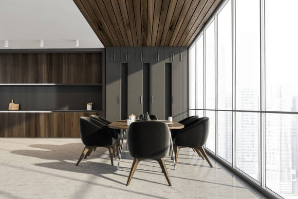 istock Kitchen interior with dark furniture near window 1318620542