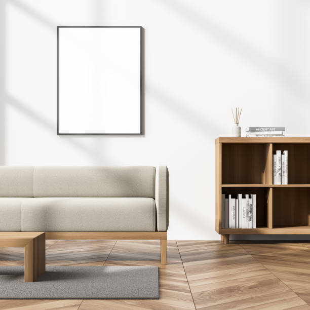 istock Bright cozy living room interior with beige sofa and poster 1318622384