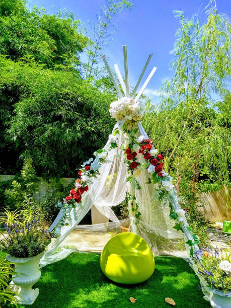 istock Teepee decoration in a sunlit garden in Asia 1318622731