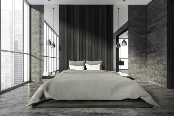 istock Grey bedroom interior with bed, panoramic windows and lamps 1318622922
