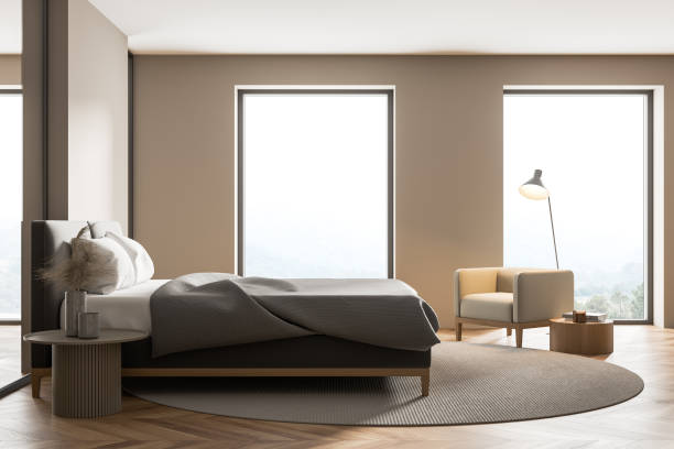 istock Modern cozy bedroom interior with large comfortable bed 1318624735