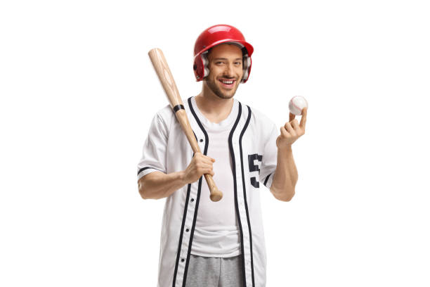 istock Baseball player with a helmet holding a ball and a bat 1318626506