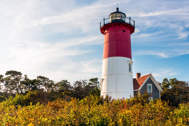 istock Beautiful metal lighthouse on a sunny autumn evening 1318627835