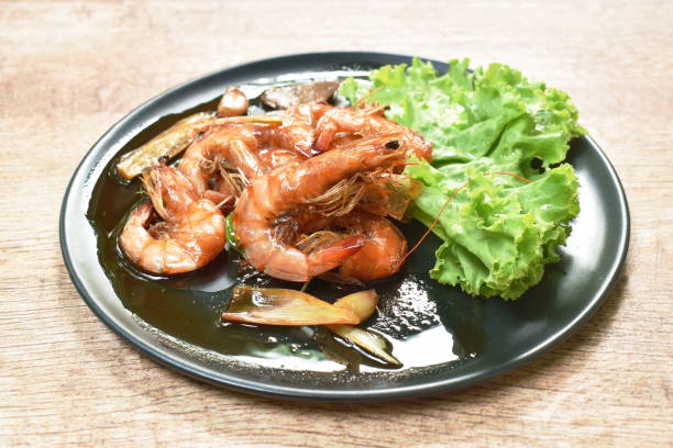 istock fried sweet shrimp with herb and lettuce arranging 1318629569