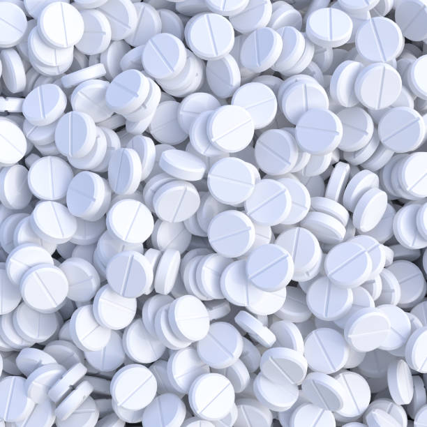 istock Pile of white pills 1318633918