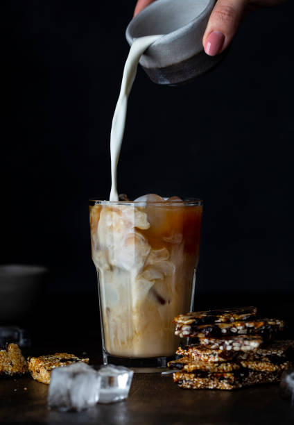 istock Iced coffee in a glass with milk 1318635425