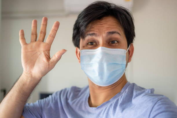 istock Asian man with medical mask 1318635794