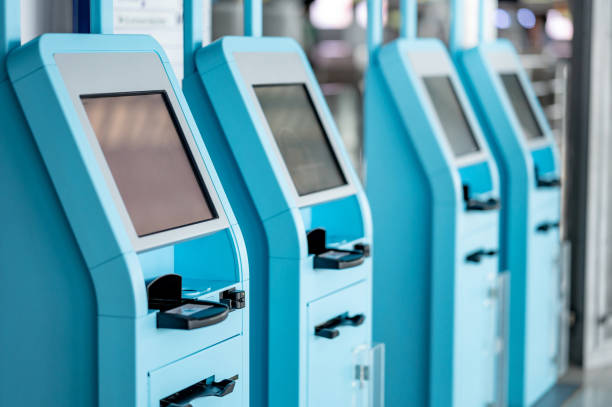istock Self check-in kiosk in airport terminal 1318636758