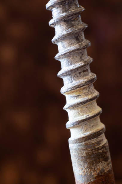 istock Diagonal Close-up of Old, Weathered Screw Threads 1318638505
