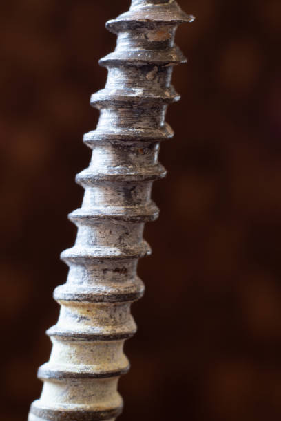 istock Diagonal Close-up of Old, Weathered Screw Threads 1318638510