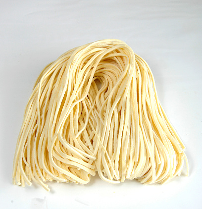 Strangozzi or Stringozzi is a typical handmade pasta made in the Umbria region in Italy