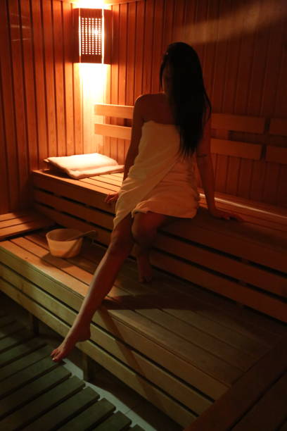 istock two beautiful young women in sauna 1318647620