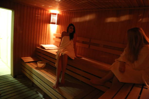 istock two beautiful young women in sauna 1318647812