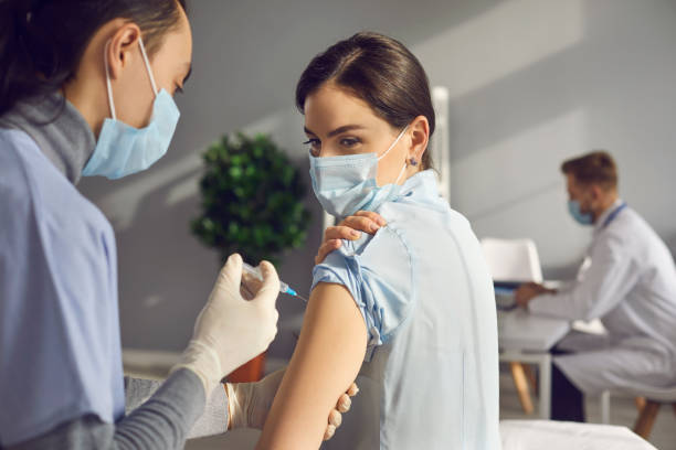 istock Vaccinating against COVID-19 infection concept 1318650158