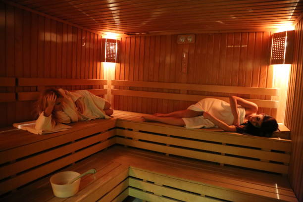istock two beautiful young women in sauna 1318650542