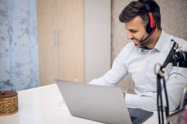 istock Portrait of a happy man working as a customer support operator 1318652233