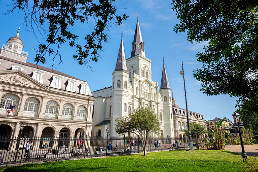 New Orleans, Louisiana USA - May 1, 2014: The beautiful Saint Louis Cathedral and museums seen from Jackson Square in the historic French Quarter district.