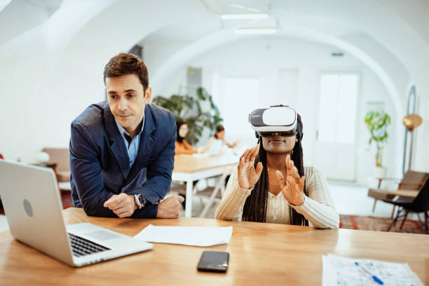 istock Young business people working in office after reopening 1318656770