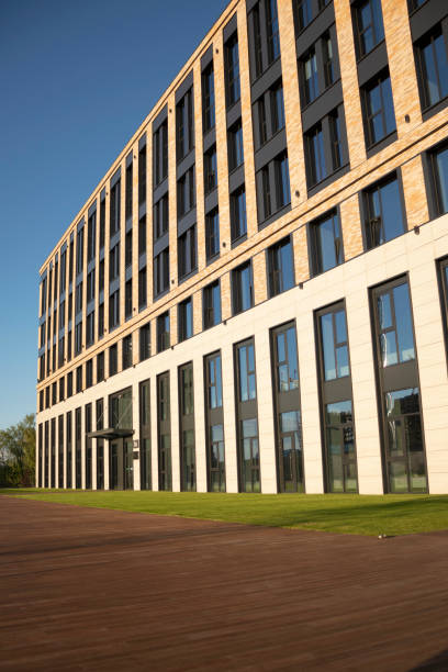 istock High Tech Corporate Office Building Exteriors. building profile. 1318657626