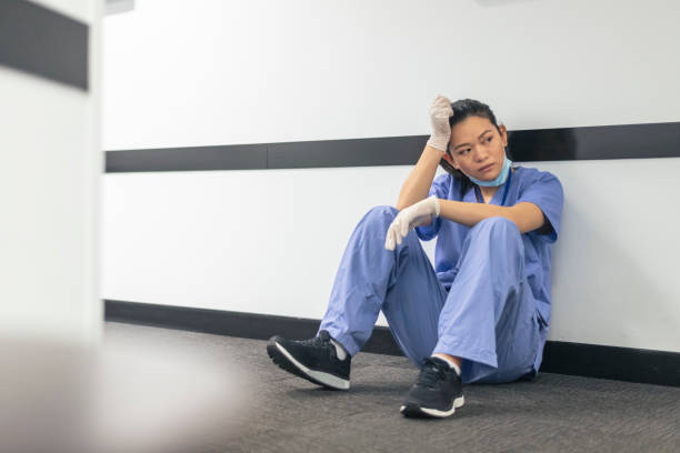 istock Nurse dealing with COVID-19 burnout 1318664502