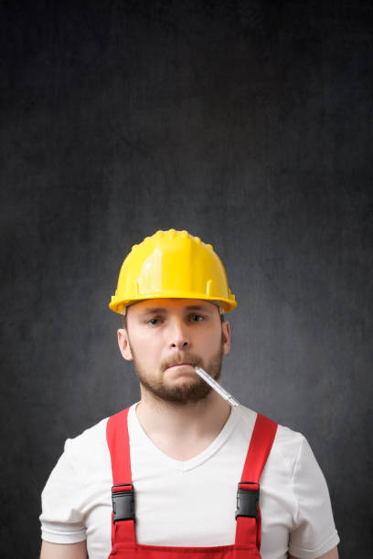 istock Portrait of a sick construction worker 1318666739