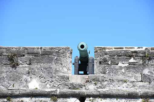 Cannon along the wall of a fort.
