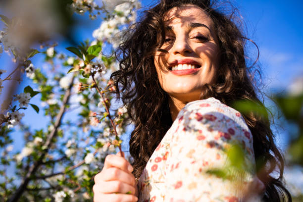 istock A beautiful woman enjoying spring 1318673457