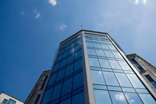 istock Financial Building Reflecting with Sunlight and Blue Sky in the Downtown 1318674723