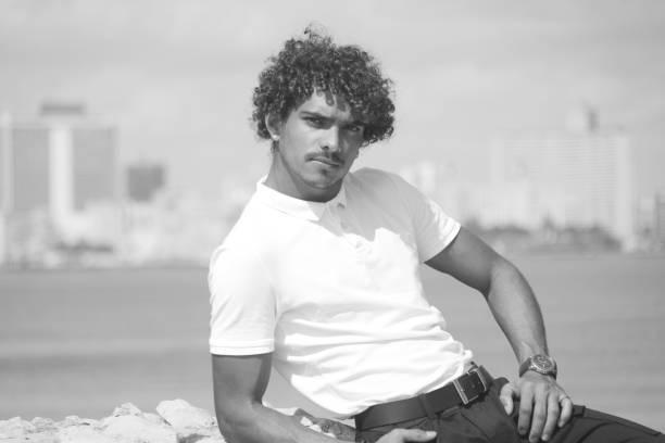istock Portrait a young man on the coast 1318675200