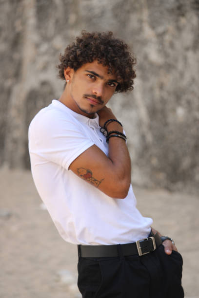 istock Portrait a young man on the coast 1318676208