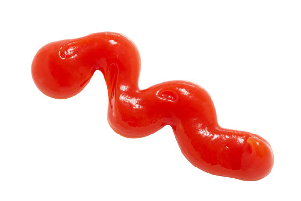 istock Ketchup splash, red tomato sauce isolated on white background with clipping path, element of packaging design. Full depth of field. 1318677684