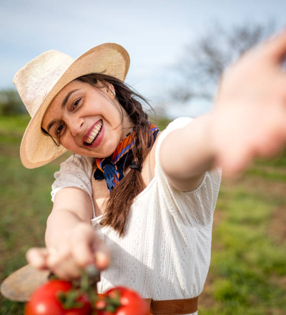 istock Woman tomato and selfie 1318677975