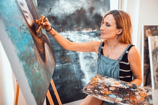 Professional Artist working at her studio