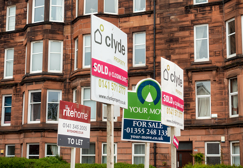 Glasgow, Scotland - A group of property signs in the Cathcart district of Glasgow's Southside for properties to let, for sale and that have sold.