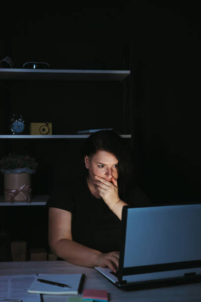 istock Shocked stressed woman mistaken at night work 1318680986