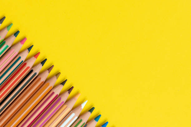 istock Coloring pencils isolated on yellow background close up concept with copy space for text 1318683256