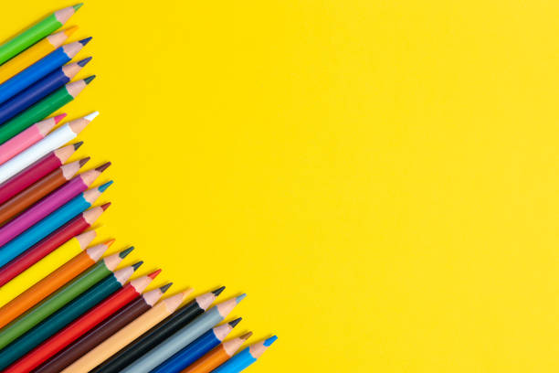 istock Coloring pencils isolated on yellow background close up concept with copy space for text 1318683350