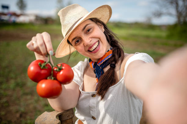 istock Woman tomato and selfie 1318685015
