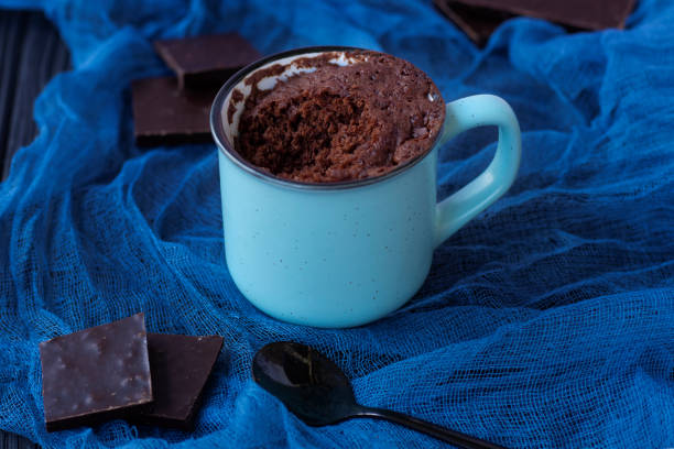 istock dessert. Mugcake. Quick chocolate cake in a mug. Homemade Brownie 1318687624