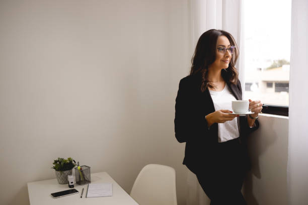 istock Young woman at her workplace 1318688237