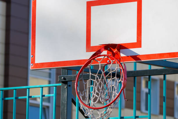istock The red basketball hoop is broken and bent down 1318690416